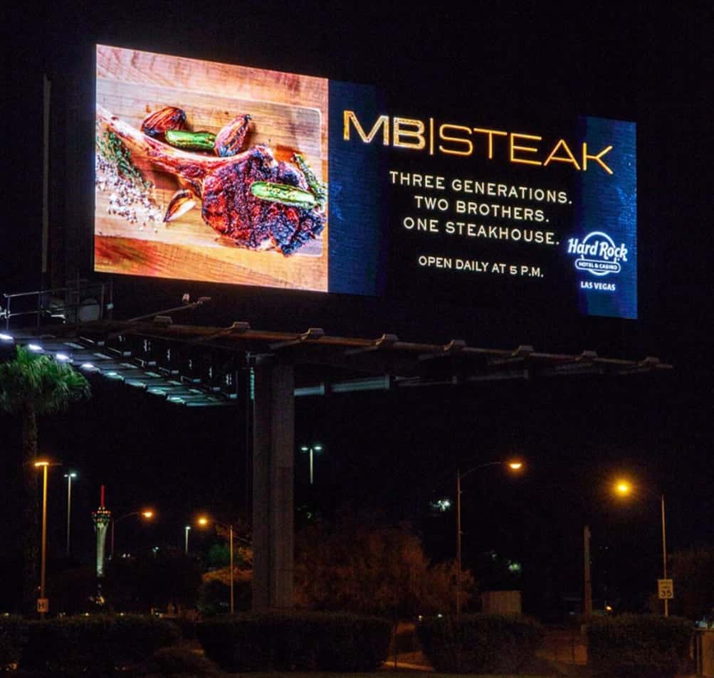 highway billboard night